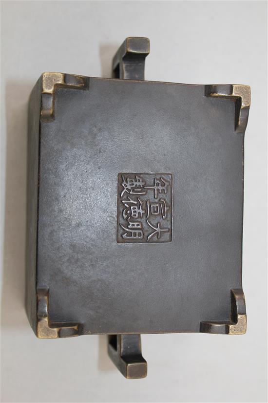 A Chinese bronze rectangular censer, Fang Ding, Xuande six character mark, 18cm. across, 9cm.